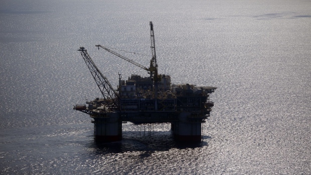 An offshore worker stands aboard the Chevron Corp. Jack/St. Malo deepwater oil platform in the Gulf of Mexico off the coast of Louisiana, U.S., on Friday, May 18, 2018. While U.S. shale production has been dominating markets, a quiet revolution has been taking place offshore. The combination of new technology and smarter design will end much of the overspending that's made large troves of subsea oil barely profitable to produce, industry executives say. Photographer: Luke Sharrett/Bloomberg