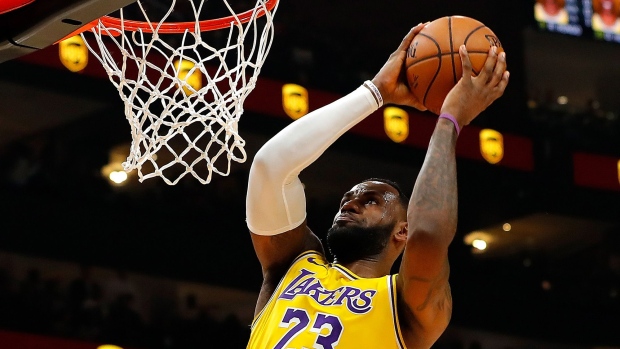LeBron James of the Los Angeles Lakers dunks against the Atlanta Hawks in the first half at State Farm Arena in Atlanta in 2019. 