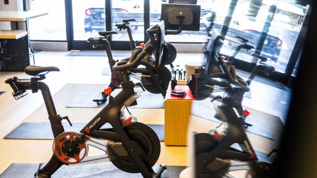 Peloton stationary bikes for sale at the company's showroom in Dedham, Massachusetts, U.S., on Wednesday, Feb. 3, 2021. Peloton Interactive Inc. is scheduled to release earnings figures on February 4. Photographer: Adam Glanzman/Bloomberg