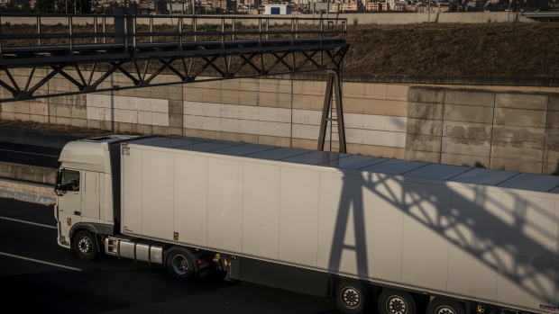 A truck on the B23 highway towards Barcelona, Spain, on Thursday, Sept. 9, 2021. Whether it’s truckers, warehouse operators, chefs or waiters, the global food ecosystem is buckling due to a shortage of staff. Photographer: Angel Garcia/Bloomberg
