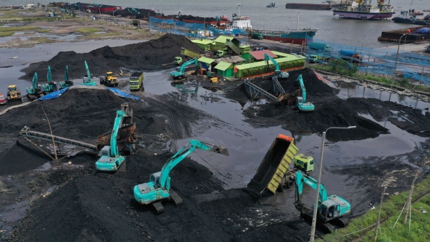 Piles of coal at Karya Citra Nusantara (KCN) Marunda Port in Jakarta, Indonesia, on Wednesday, Jan. 19, 2022. Indonesia, the top thermal coal exporter, will keep a broad ban on January shipments in place even as exemptions have allowed some fuel-laden vessels to depart.