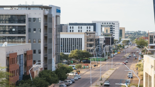 Commercial buildings, including the Barclays Bank of Botswana Ltd. office, second right, stand in the central business district of Gaborone, Botswana, on Monday, May 14, 2018. Botswana’s new leader, President Mokgweetsi Masisi, wants to shrink the civil service, sell state companies and cut red tape as he targets increased foreign investment. Photographer: Waldo Swiegers/Bloomberg