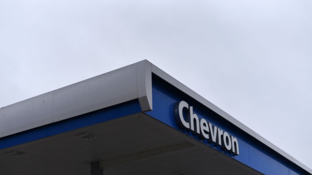 Signage at a Chevron gas station in Houston, Texas, U.S., on Wednesday, Oct. 28, 2020. Chevron Corp. is scheduled to release earnings figures on October 30. Photographer: Callaghan O'Hare/Bloomberg