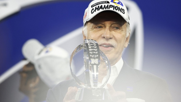 Los Angeles Rams owner Stan Kroenke holds the George Halas Trophy after defeating the San Francisco 49ers in the NFC Championship Game at SoFi Stadium in Inglewood, California, on Jan. 30, 2022. Photographer: Ronald Martinez/Getty Images