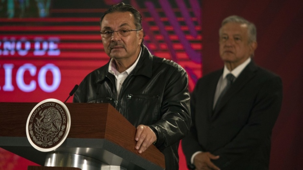 Octavio Romero Oropeza, chief executive officer of Petroleos Mexicanos (PEMEX), speaks while Andres Manuel Lopez Obrador, Mexico's president, right, listens during a news conference at the National Palace in Mexico City, on Jan. 7, 2020.