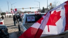 Protesters block access to the Ambassador Bridge in Windsor, Ontario on Feb. 9, 2022.