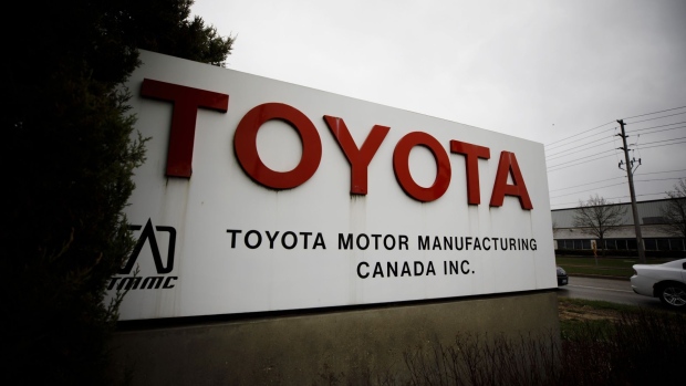 Signage stands outside the Toyota Motor Corp. manufacturing facility in Cambridge, Ontario, Canada, on Monday, April 29, 2019. Fred Volf, president of Toyota Motor Manufacturing Canada Inc., said that the automaker will produce the Lexus NX crossover, in gasoline and hybrid versions, beginning in 2022 at the plant. Photographer: Cole Burston/Bloomberg