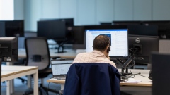 An office worker at a desk in the offices of Arcadis NV, after increasing their workplace capacity on July 19, in London, U.K. on Monday, Aug. 2, 2021. A survey this month showed that just 17% of London’s white-collar workers want a full-time return, and many said it’d take a pay rise to get them back five days a week. Photographer: Jason Alden/Bloomberg