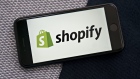 The Shopify Inc. logo is displayed on a smartphone in an arranged photograph taken in Arlington, Virginia, U.S., on Thursday, April 23, 2020. Shopify's C$38 billion ($27 billion) stock-market gain since the beginning of the year has some analysts calling a time out as the e-commerce services provider has surged 61% to a market value of C$97 billion. Photographer: Andrew Harrer/Bloomberg