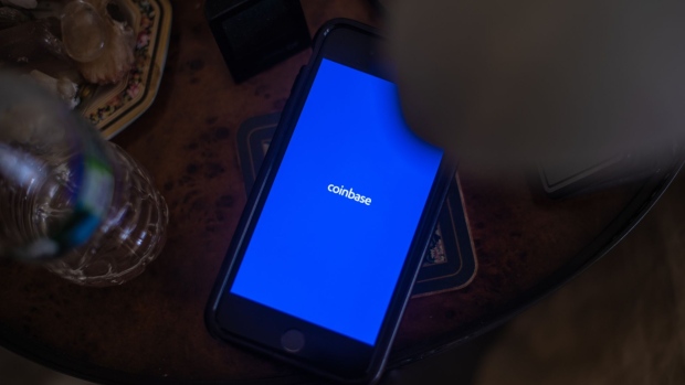 The Coinbase logo on a smartphone arranged in Hastings-on-Hudson, New York, U.S., on Monday, Jan. 4, 2021. Coinbase Inc. knew cryptocurrency XRP was a security rather than a commodity and "illegally" sold Ripple Labs Inc.'s tokens anyway, a customer argues in a proposed class-action lawsuit over the commissions the crypto exchange collected.