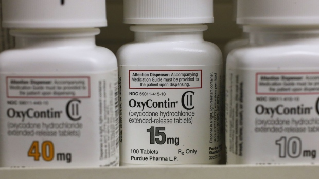 Bottles of Purdue Pharma L.P. OxyContin medication sit on a pharmacy shelf in Provo, Utah, U.S., on Wednesday, Aug. 31, 2016.