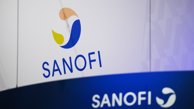 Logos on the Sanofi exhibition stand at the Viva Technology conference at Porte de Versailles exhibition center in Paris, France, on Friday, June 18, 2021. Viva Tech is dedicated to innovation and startups and runs June 16 - 19. Photographer: Nathan Laine/Bloomberg