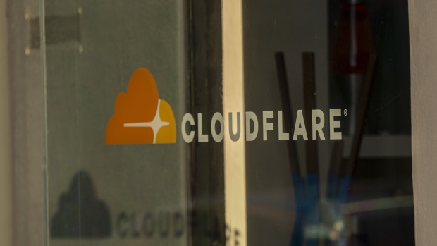 Pedestrians outside the Cloudflare headquarters in San Francisco, California, U.S., on Tuesday, Feb. 8, 2022. Cloudflare Inc. is expected to release earnings figures on Feb. 10.