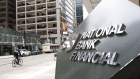 Signage is displayed outside National Bank Financial Inc. in the financial district of Toronto, Ontario, Canada, on Friday, Feb. 14, 2020.