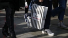 A shopper carries a Foot Locker Inc. shopping bag in London, U.K, on Thursday, Oct. 31, 2019. In the lead-up to the vote, “both Labour and the Conservatives are expected to come out with pretty punchy views on tax, innovation and public spending, which could have significant implications for both corporates and consumers,” Emma Wall, head of investment analysis at stockbroker Hargreaves Lansdown Plc, said by email. Photographer: Hollie Adams/Bloomberg