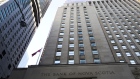 The Bank of Nova Scotia stands in the financial district of Toronto, Ontario, Canada, on Friday, Feb. 21, 2020. Canadian stocks declined with global markets, as authorities struggled to keep the coronavirus from spreading more widely outside China. However, investors flocking to safe havens such as gold offset the sell-off in Canada's stock market.