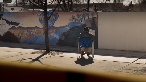 A senior citizen sits outside a senior services center in Reno, Nevada, U.S., on Tuesday, Feb. 18, 2020. The elderly share of the state's population is expected to rise over the next decade, driven by emigrating Californians seeking lower costs and the aging of the prodigious baby boomer population. Photographer: Patrick Mouzawak/Bloomberg