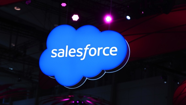 A Salesforce.Com Inc. logo sits on an illuminated iCloud lightbox hanging from the ceiling at the CeBIT 2017 tech fair in Hannover, Germany, on Sunday, March 19, 2017. Leading edge technologies in the digital world are showcased in this annual event which runs March 20 - 24. Photographer: Krisztian Bocsi/Bloomberg
