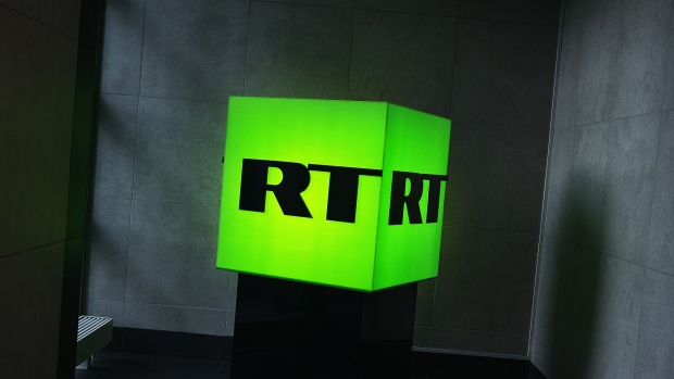 MOSCOW, RUSSIA - DECEMBER 06: (EDITORS NOTE: Image has been reviewed by RT prior to transmission.) The RT logo displayed in its office on December 6, 2019 in Moscow, Russia. RT, formerly known as Russia Today, is a state-funded TV network that produces news content in English and several other languages. The network insists it is no different from other global broadcasters, like the BBC, albeit one that offers alternative views to the mainstream Western media. Western governments, however, see the network as an instrument of the Russian government. (Photo by Misha Friedman/Getty Images)
