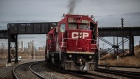 A Canadian Pacific Railway locomotive pulls a train in Calgary, Alberta, Canada, on Monday, March 22, 2021. Canadian Pacific Railway Ltd. agreed to buy Kansas City Southern for $25 billion, seeking to create a 20,000-mile rail network linking the U.S., Mexico and Canada in the first year of those nations; new trade alliance.