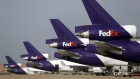 FedEx Corp. jet freighters sit parked at Memphis International Airport in Memphis, Tennessee, U.S., on Wednesday, Sept. 18, 2013.