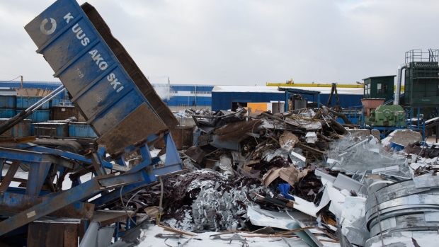 A truck offloads scrap metal onto a pile in the yard at the Petromax JSC waste recycling complex, operated by Kuusakoski Group Oy, in Lobnya, outside Moscow, Russia, on Thursday, Jan. 23, 2020. Moscow and its surrounding region generate 17% of Russia’s annual 70 million tons of household rubbish. Photographer: Andrey Rudakov/Bloomberg