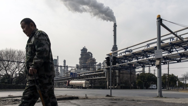 Smoke rises from a petrochemical production complex on the outskirts of Shanghai, China, on Tuesday, March 1, 2022. Oil extended its relentless rally before an OPEC+ meeting as the International Energy Agency warned that global energy security is under threat following Russia’s invasion of Ukraine. Photographer: Qilai Shen/Bloomberg
