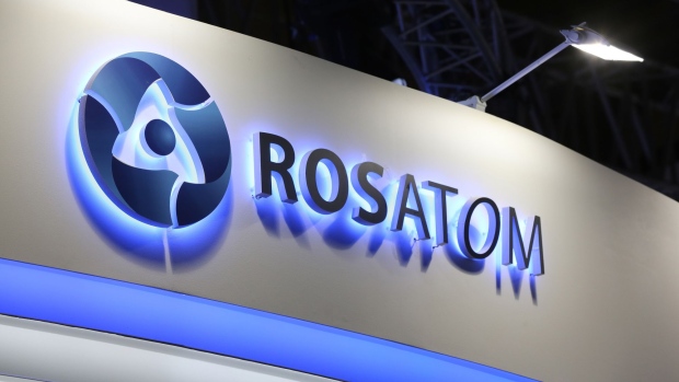The logo of Rosatom Corp. sits on display above the company's corporate pavilion at the Moscow Financial Forum (MFF) in Moscow, Russia, on Friday, Sept. 8, 2017. Russia laid the groundwork for an operation that will reduce some of its closest and biggest dollar bond payments before the end of the year. Photographer: Andrey Rudakov/Bloomberg