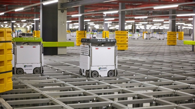 At Ocado’s warehouse near London, each robot travels up to 35 miles per day.