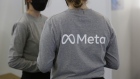 Company representatives wear branded t-shirts at the Meta Platforms Inc. area on the opening day of the MWC Barcelona at the Fira de Barcelona venue in Barcelona, Spain, on Monday, Feb. 28, 2022. Over 1,800 exhibitors and attendees from 183 countries will attend the annual event, which runs from Feb. 28 to March 3. Photographer: Angel Garcia/Bloomberg
