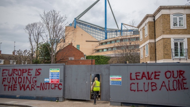 Graffiti at a construction site next to Stamford Bridge stadium in London on March 11. Photographer: Chris J Ratcliffe/Getty Images Europe