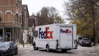 A FedEx Corp. Ground truck drives through the Bucktown neighborhood of Chicago, Illinois, U.S., on Monday, Nov. 30, 2020. Online shoppers in the U.S. are expected to drop a record-busting $12.7 billion on Cyber Monday -- the busiest e-commerce day of the year -- presenting a valuable opportunity for retailers whose websites, customer service departments and delivery operations can withstand the period of crushing traffic.