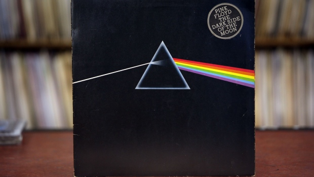 A vinyl LP for "Dark Side of the Moon" by Pink Floyd, a band signed to the EMI music label.