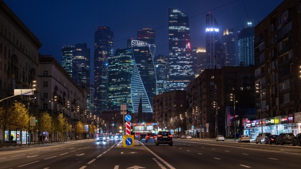 Illuminated skyscraper buildings at night in the Moscow International Business Center (MIBC), also known as Moscow City, district of Moscow, Russia, on Thursday, Oct. 21, 2021. The Bank of Russia is set to raise interest rates, but uncertainty about the size of the hike has intensified.