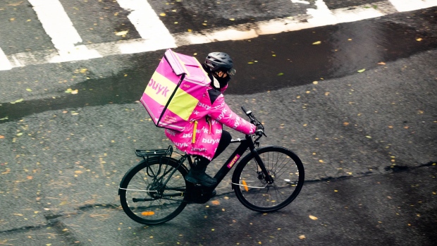 A Buyk delivery person rides a bicycle on the Upper West Side on November 12, 2021 in New York City.