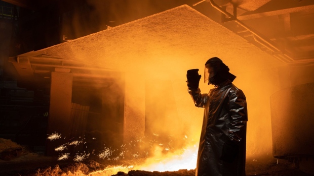 A worker inspects a blast furnace at the Cherepovets Steel Mill, operated by Severstal PJSC, in Cherepovets, Russia, on Friday, Dec. 3, 2021. Even if the recently-identified omicron variant proves less deadly than feared, traders are weighing a weakening growth outlook that could hurt demand for industrial commodities in the months ahead.