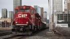 A Canadian Pacific Railway locomotive pulls a train in Calgary, Alberta, Canada, on Monday, March 22, 2021. Canadian Pacific Railway Ltd. agreed to buy Kansas City Southern for $25 billion, seeking to create a 20,000-mile rail network linking the U.S., Mexico and Canada in the first year of those nations; new trade alliance. Photographer: Alex Ramadan/Bloomberg
