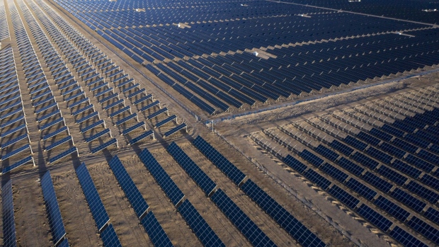 Photovoltaic modules at a solar power plant near Golmud, Qinghai province, China, on Saturday, Sept. 11, 2021. China is opening up its market for trading green energy, making it easier for multinationals from BMW AG to Airbus SE to buy wind and solar power and reach aggressive emissions goals.