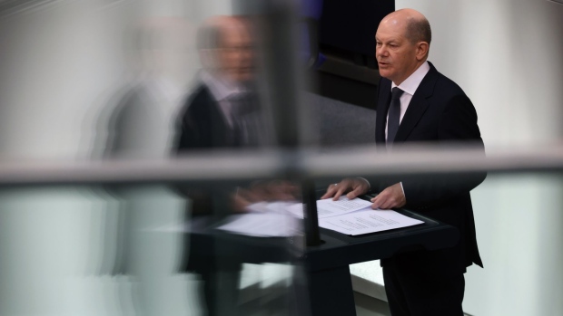 Olaf Scholz speaks at the Bundestag in Berlin, on March 23.