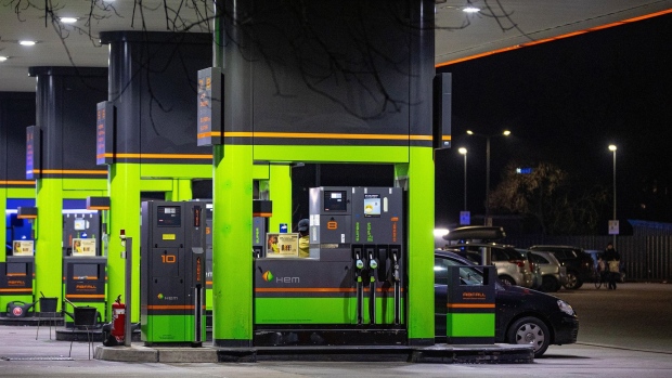 A customer refuels at an HEM gas station, operated by Deutsche Tamoil GmbH, in Berlin, Germany, on Tuesday, March 15, 2022. Germany's Finance Minister Christian Lindner and the FDP want to compel gas-station operators to cap pump prices and the government would then compensate them directly for the lost revenue, according to an FDP official who asked not to be identified discussing confidential information. Photographer: Krisztian Bocsi/Bloomberg