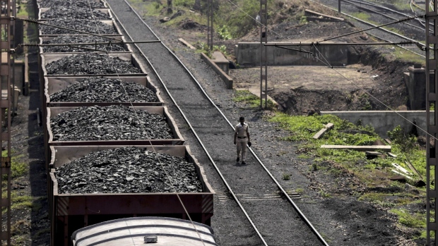 A freight train laden with coal stands on the tracks in Paradeep, Odisha, India, on Monday, May 6, 2019. Authorities launched a massive restoration-and-relief effort after Cyclone Fani left a trail of damage in eastern India and Bangladesh. Photographer: Dhiraj Singh/Bloomberg