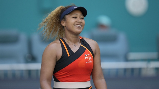 MIAMI GARDENS, FLORIDA - MARCH 28: Naomi Osaka of Japan celebrates after defeating Alison Riske of United States during the Women’s Singles match on Day 8 of the 2022 Miami Open presented by Itaú at Hard Rock Stadium on March 28, 2022 in Miami Gardens, Florida. (Photo by Mark Brown/Getty Images)