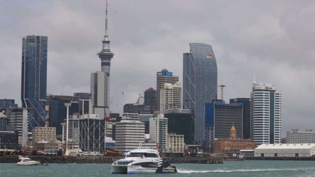 The Sky Tower and buildings in Auckland, New Zealand, on Sunday, Dec. 5, 2021. New Zealand’s largest city has exited lockdown, bringing relief to its residents but also signaling the likely spread of Covid-19 to the rest of the country. Photographer: Brendon O'Hagan/Bloomberg