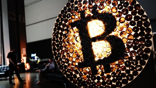 A illuminated Bitcoin icon during NFT LA in Los Angeles, California, U.S., on Tuesday, March 29, 2022. NFT LA is an integrated conference experience fused with immersive Metaverse integrations. Photographer: Bing Guan/Bloomberg
