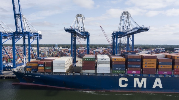 A container ship docked at the Port of Charleston in Charleston, South Carolina, U.S., on Wednesday, Nov. 3, 2021. The supply crunch that has dogged the global shipping industry could worsen before it gets better, with new challenges ranging from crew retention to wage inflation.