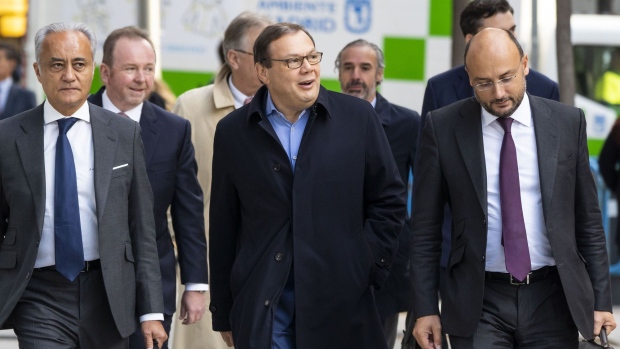 Mikhail Fridman, billionaire and co-founder of LetterOne Holdings SA, center, arrives for a hearing at the Audiencia Nacional court in Madrid, Spain, on Monday, Oct. 21, 2019. The prosecutor wants the magistrate to look at allegations that Fridman helped to undermine Grupo Zed's business and then acquire it at a knockdown price, El Pais reported, citing documents from the prosecutor’s office. Photographer: Angel Navarrete/Bloomberg