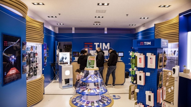 A TIM mobile phone shop, operated by Telecom Italia SpA, in Rozzano, Italy, on Tuesday, Nov. 23, 2021. KKR & Co. is setting the stage for a battle of control at Telecom Italia with a 10.8 billion-euro ($12.2 billion) bid pitting the U.S. private-equity fund against France’s Vivendi SE.