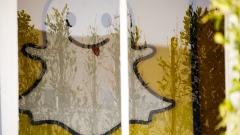 An Snapchat Inc. ghost logo is seen inside the company's building in the Venice Beach neighborhood of Los Angeles, California, U.S., on Wednesday, Feb. 7, 2018. Snap's first earnings beat as a public company, prompted at least five upgrades from analysts after the social-media company reported fourth-quarter revenue and daily active users ahead of estimates. Photographer: Patrick T. Fallon/Bloomberg