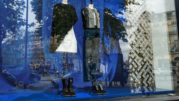 A window display at a Louis Vuitton luxury goods store on the Champs-Elyses in Paris, France, on Thursday, April 7, 2022. The cost of living is a major issue in the French presidential election, with recent polls showing incumbent Emmanuel Macron's lead over far-right candidate Marine Le Pen narrowing ahead of Sunday’s first-round vote.