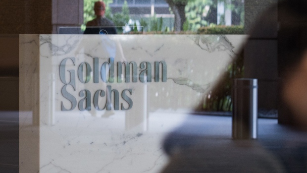 The Goldman Sachs Group Inc. logo is displayed in the reception area of the One Raffles Link building, which houses one of the Goldman Sachs (Singapore) Pte offices, in Singapore. Photographer: Nicky Loh/Bloomberg